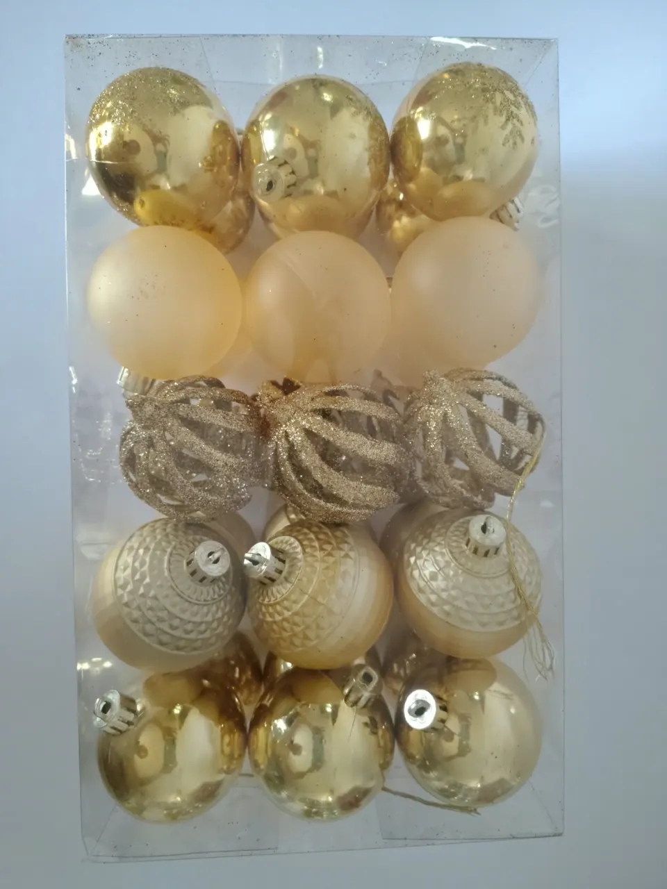 Bolas doradas de texturas surtidas, 6 cm · caja × 30