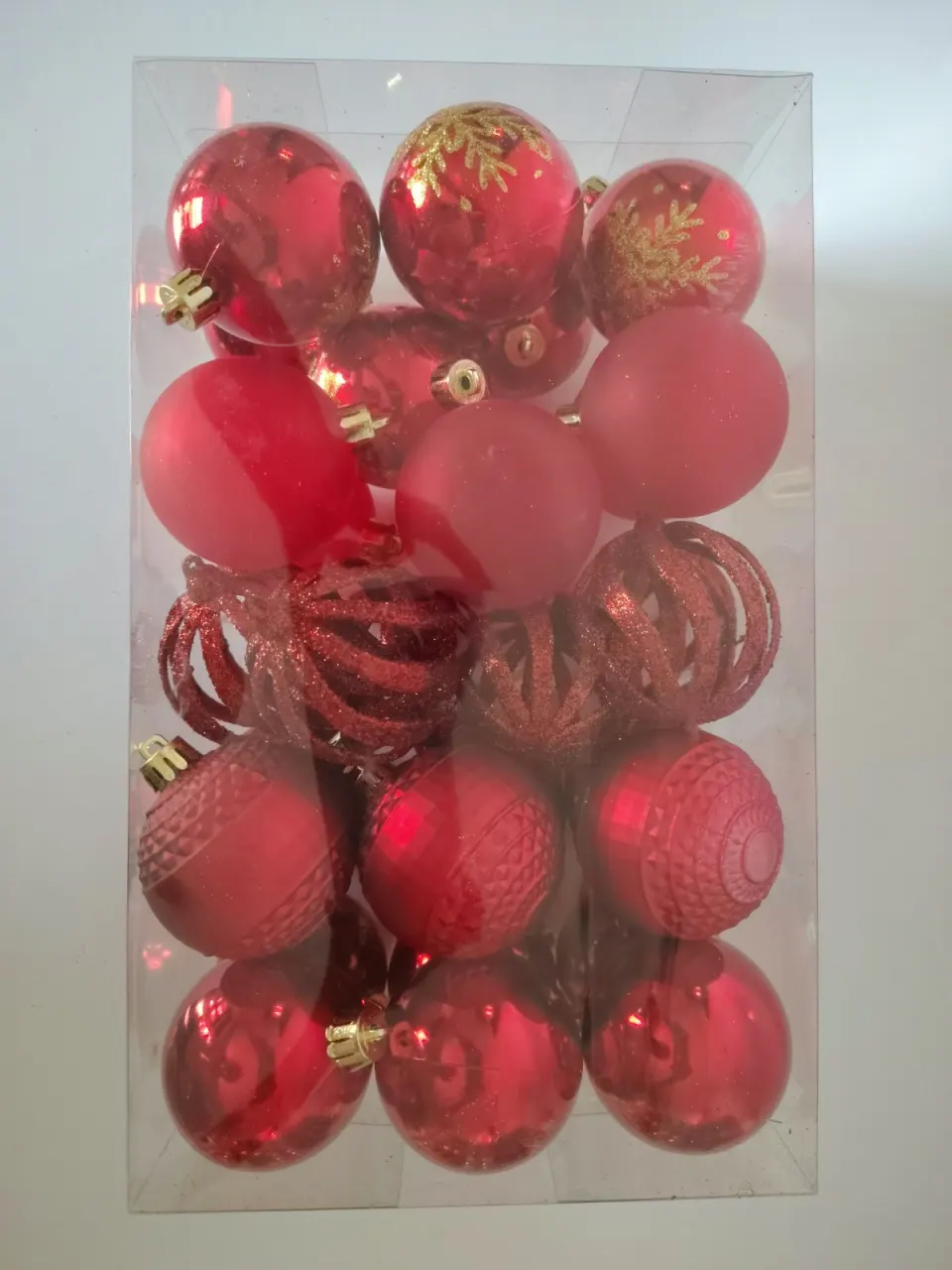 Bolas rojas de texturas surtidas, 6 cm · caja × 30